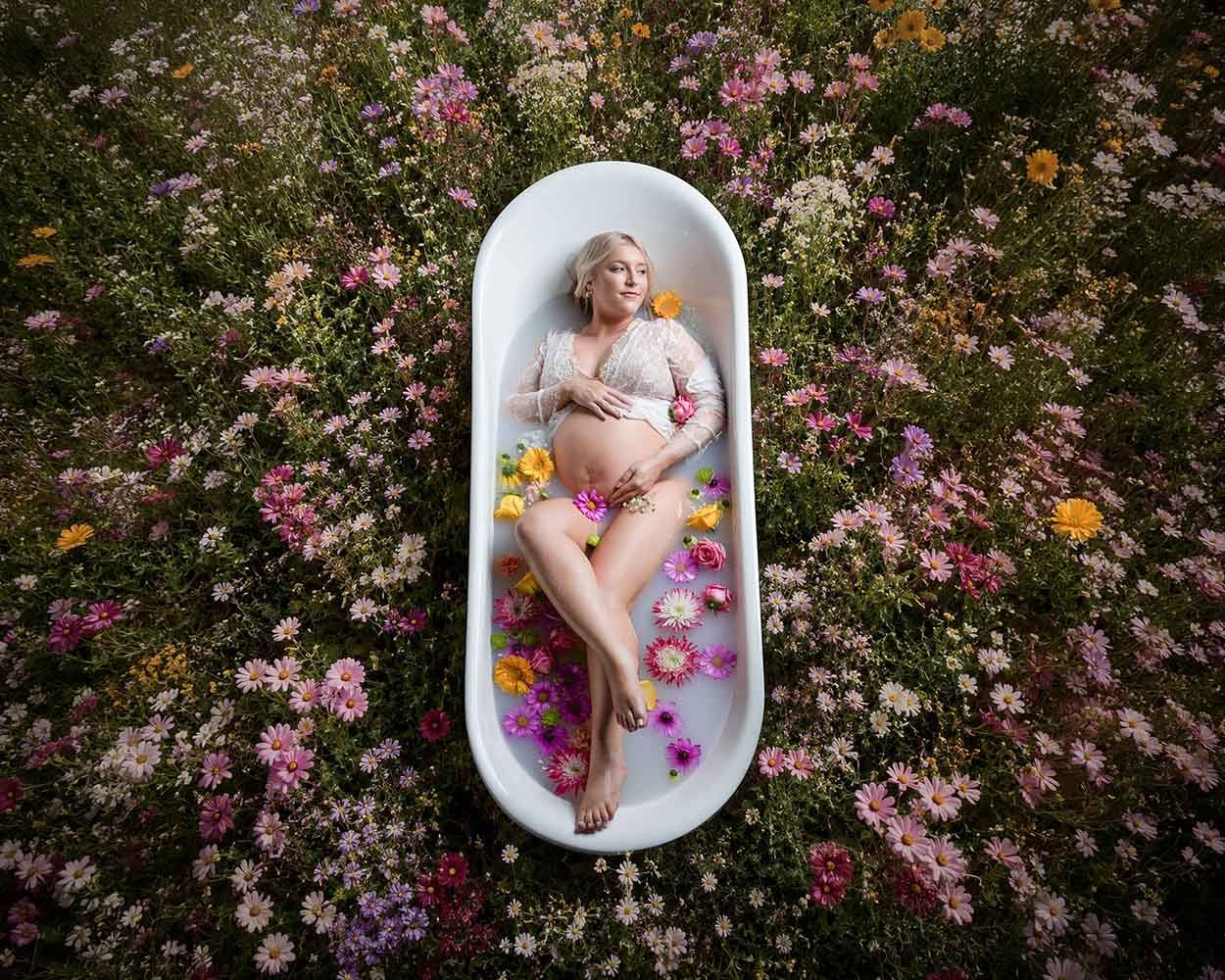 Maternity milk bath in a field of wildflowers by Maternity Haus
